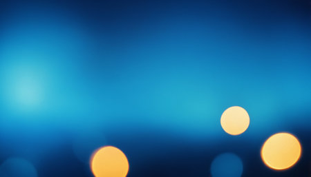 abstract background of bokeh defocused lights on blue backgroundの素材