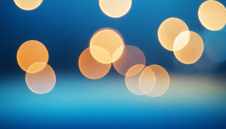 Abstract circular bokeh background, defocused lights on blue backgroundの素材