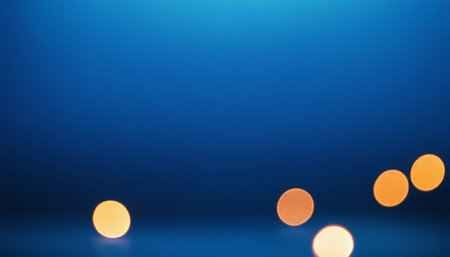abstract background with bokeh defocused lights on blue backgroundの素材