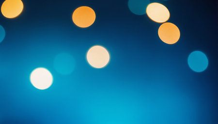 Abstract circular colorful bokeh from the party light on blue backgroundの素材