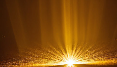 abstract golden background with rays of light and bokeh effectの素材
