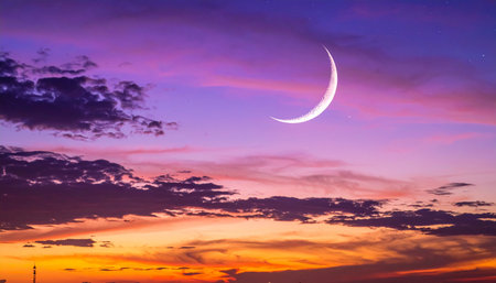 Crescent moon in the sky at sunset, Ramadan Kareem backgroundの素材