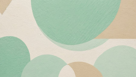 A close-up view of a textured surface with abstract geometric shapes. Dominant colors are a soft pastel green, a muted beige, and a creamy off-white. The shapes include overlapping circles, semi-circles, and a triangle, creating a layered and organic composition. The texture of the surface is visible, suggesting paint or a similarの素材
