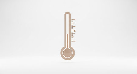 A minimalist beige thermometer is presented against a clean, light background. The instrument a bulb at the bottom and a long, thin tube with clear markings indicating temperature. A small amount of brown liquid is visible within the tube, showing a moderate reading. The overall aesthetic is simple, modern, and neutral, concepts related to measurement, science, or health.の素材