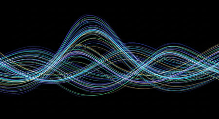 This abstract a series of luminous, flowing lines of light against a stark black background. The lines are predominantly in shades of blue, green, and teal, with subtle hints of yellow and white, creating a vibrant yet harmonious visual. They form undulating waves and curves, suggesting movement and energy. The overall effect is sleek and modern, evoking concepts of sound waves, data streams, or digital The dark backdrop emphasizes the brilliance of the light trails.の素材