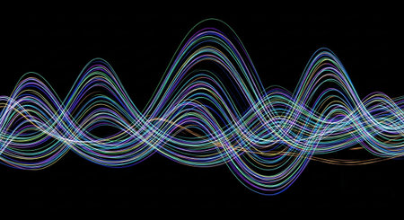This abstract a delicate interplay of intertwined light streams against a deep black background. The colors are soft pastel shades of blue, purple, and green, with subtle variations in hue and brightness. The luminous lines form gentle, undulating waves and curves, creating a sense of serene motion and ethereal beauty. This visual could represent abstract concepts like data flow, sound waves, or simply an artistic expression of light and form. The overall impression is and tranquil.の素材