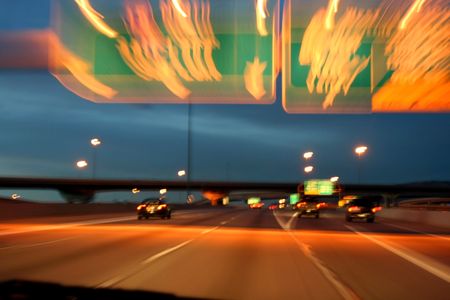 Abstract Blurry Highway with Cars at Night