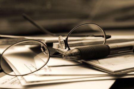 Close up on the Glasses and the Checkbookの写真素材
