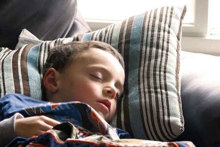 Little Boy Sleeping on the Couch