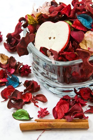 Isolated potpourri - close up on dried leaves and roseの写真素材