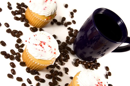 Isolated Coffee Mug with beans and cupcakesの写真素材