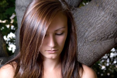 Close up on a Beautiful Depressed Teenager Posingの写真素材