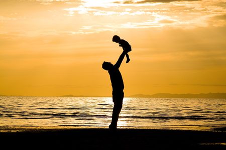Father andSson on the Beach - Silhouette Shotの写真素材