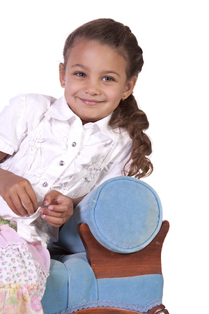 Beautiful Cute Little Girl Posing on an Isolated White Backgroundの写真素材
