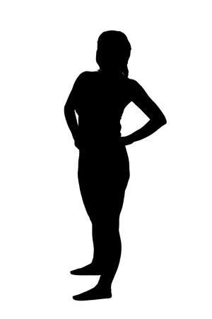 Silhouette of a woman standing up and posingの写真素材
