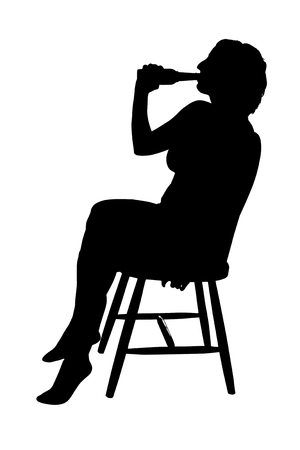 Silhouette of a woman on a chair drinking beerの写真素材