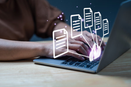 Businessman using laptop with virtual screen to backup data. Process data and manage files on cloud...
