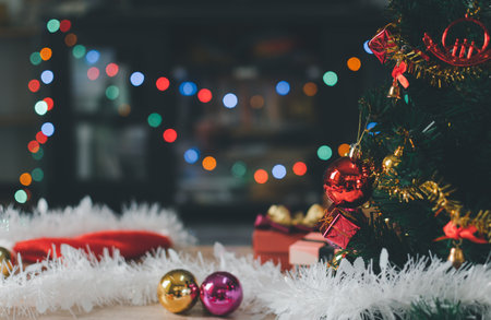 Christmas Tree In Bokeh and blur Background. Ornament And Abstract Defocused Lights. Concept Christmas Day, happy, highlights, holiday, light, merry, new year, night, season 2023. Copy space on rightの写真素材