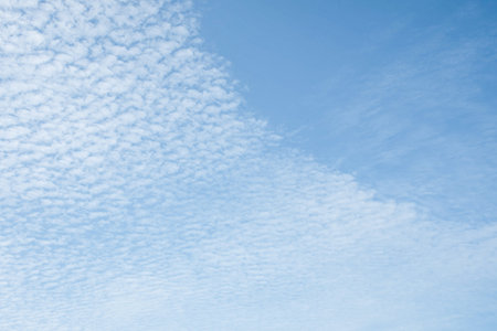 Fresh blue sky and soft white clouds, clean on a hot summer day. There is a copy space to put the...