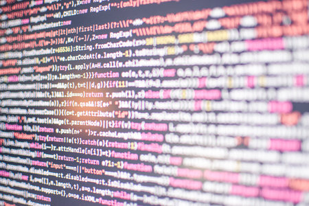 Script HTML5 in an editor for website development. Coding script text on the monitor. Computer...