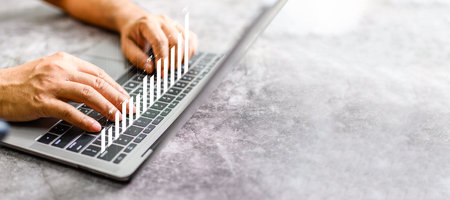 Concept businessman is analyzing the positive 2022 indicators of business and financial growth. to...