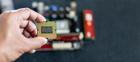 Closeup, Man holding CPU (Central processor Unit), Concept for fix, repair, mend,  restore, service,...