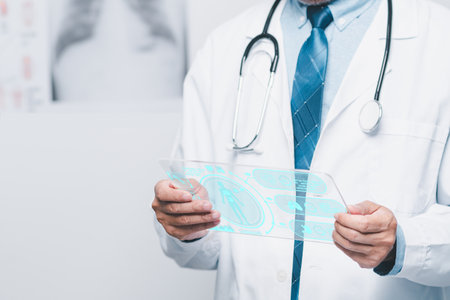 doctor man hold a virtual screen lung for checking lung disease in laboratory of hospital. virtual x-ray lung shows respiratory disease. physician do diagnostic infection of lung and respiratory humanの写真素材