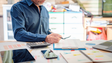 Businessman working in office, Maximizing Business Efficiency and Profitability concept, Power of Collaboration, Communication, Strategic Planning with Paperwork Management, Brokerage, and Accountingの写真素材