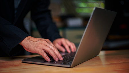 businessman connecting with his team online in office