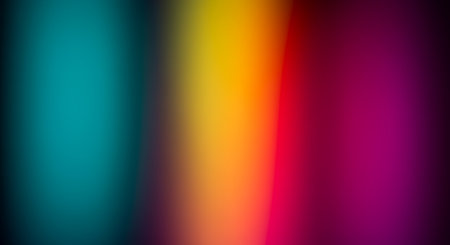 A smooth, abstract gradient transitions through vibrant shades of teal, yellow, orange, and magenta, creating a visually dynamic and modern background design.の素材