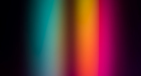 A captivating abstract image showcasing a smooth gradient of vibrant colors, transitioning from deep teal through warm orange to bright magenta, creating a visually striking and modern aesthetic.の素材