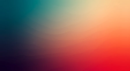 A soft, blurred abstract background that masterfully blends a spectrum of colors, starting with deep teal and transitioning through warm oranges to a vibrant pink, creating an atmospheric feel.の素材