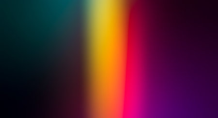 A vertical abstract composition featuring a smooth blend of teal, yellow, orange, and magenta colors, creating a vibrant and visually appealing backdrop.の素材
