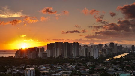 View of Honolulu city at sunset with beautiful sky and cloudsの写真素材
