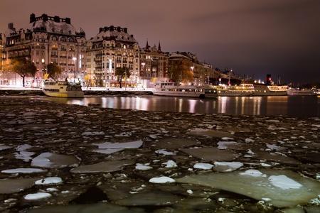 View of old builbings in Stockholm form the harbour with iced seaのeditorial素材