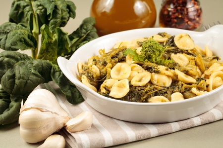 Traditional orecchiette pasta with turnip tops. Spicy recipe from Apulia, in southern Italyの写真素材
