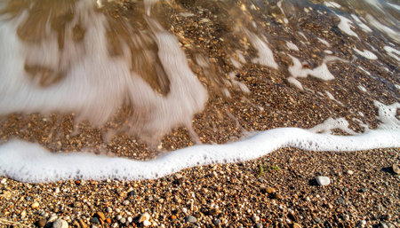 wave of the sea on the pebble beach, nature seriesの素材