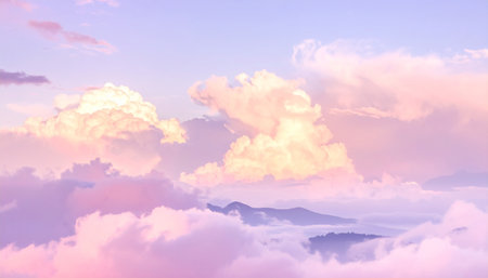 Fog showing soft pink and purple clouds floating above misty mountain peaks at sunrise or sunset keywords: clouds,...の素材