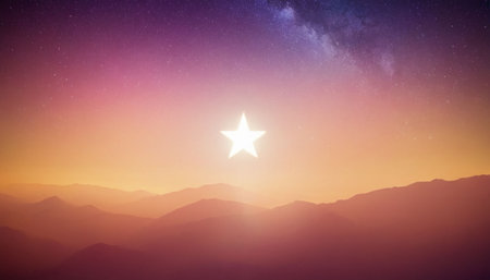 A white star is centered in a soft orange and purple sky, casting a glow over hazy mountain silhouettes at the...の素材