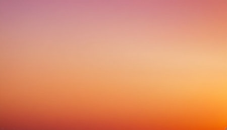 Gradient showing soft gradient background of pink purple and orange hues blending seamlessly together creating a...の素材