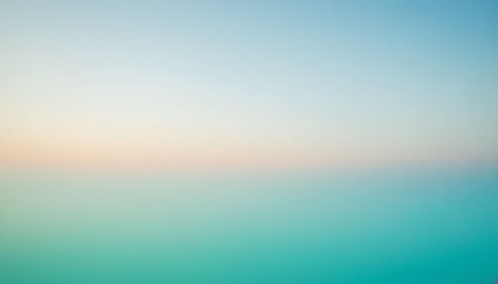 With showing tranquil horizon with soft pastel peach and teal blue sky and ocean gradient. resolutionの素材