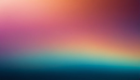 A vibrant gradient transitions from dark blue and teal at the bottom to pink, orange, and yellow at the creating a...の素材