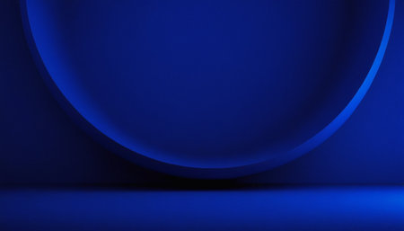 A deep blue abstract studio background a large curved arch casting a subtle shadow on a smooth floor.の素材