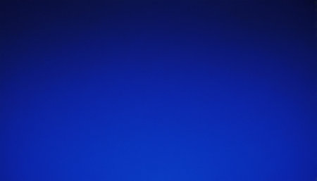 Royal showing deep royal blue solid color gradient background with subtle lighting variations across the surface....の素材