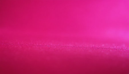 A macro shot reveals a bright pink surface with a subtle horizontal texture line and a soft light gradient.の素材