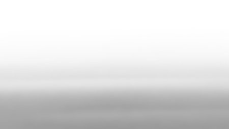 A smooth gradient transitions from bright white at the to a soft grey at the bottom, creating a minimalist backdrop.の素材