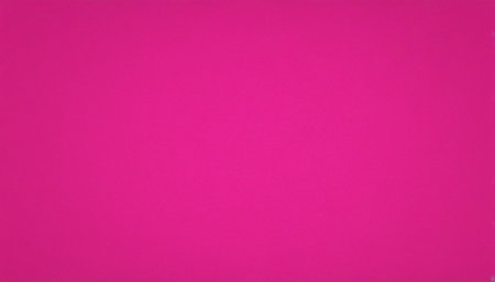 A solid bright fuchsia pink surface with a subtle texture and a soft gradient light effect across the frame.の素材