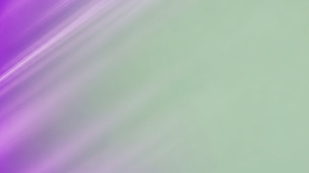A soft pastel background with diagonal streaks of light purple and pale green creating a subtle motion effect.の素材