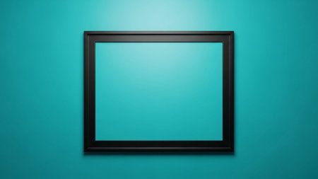 A simple black rectangular frame is centered on a smooth, vibrant teal blue wall, offering a clean display space.の素材