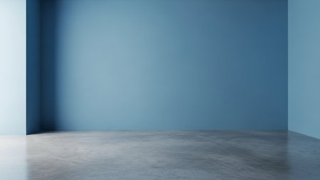 An empty room with light blue walls and a polished concrete floor reflecting soft light and shadows.の素材